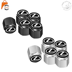 Pode incluir: Um conjunto de tampas de válvula de pneu pretas e prateadas. Cada tampa apresenta um logótipo Lexus branco sobre um fundo preto ou prateado. As tampas são hexagonais e destinam-se a uso automóvel.