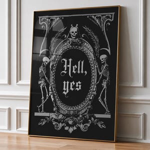 May include: A rectangular wall art print featuring a black background with a white ornate oval frame. Inside the frame, the text reads Hell, yes in a gothic font. Two skeletons stand on either side of the frame, with a skull at the top center.