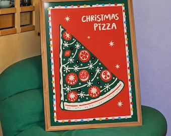 May include: A framed rectangular art print with a red background and a green border featuring colorful dots. The print displays the text "CHRISTMAS PIZZA" and a large green pizza slice decorated with white lines and red circular toppings.