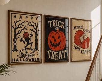 May include: Three framed rectangular wall art prints with Halloween themes. The first shows a pumpkin-headed figure in a forest with the text HAPPY HALLOWEEN. The second features a large orange pumpkin with the text TRICK OR TREAT. The third shows a red candy with a razor blade and the text ALWAYS CHECK YOUR CANDY.