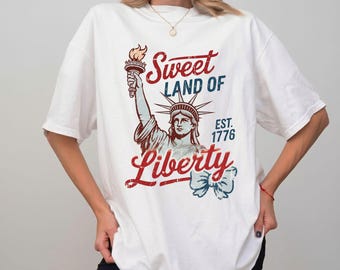 Comfort Colors® Sweet Land Of Liberty Shirt, Retro Statue Of Liberty 1776 Tee, Cute Coquette Patriotic Ribbon Bow T-Shirt, 4th Of July Gift