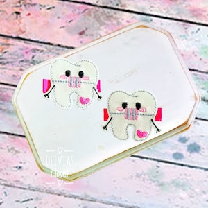 Tooth with braces hair clip
