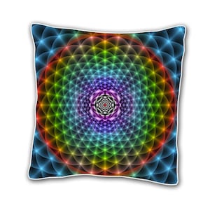 May include: A square pillow with a colorful geometric pattern. The pattern is a series of concentric circles with a starburst design in the center. The colors are red, orange, yellow, green, blue, indigo, and violet.
