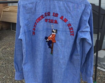 Rare Vtg 70s Embroidered Chambray Shirt "Happiness Is An Exit Visa Saudi Arabia"