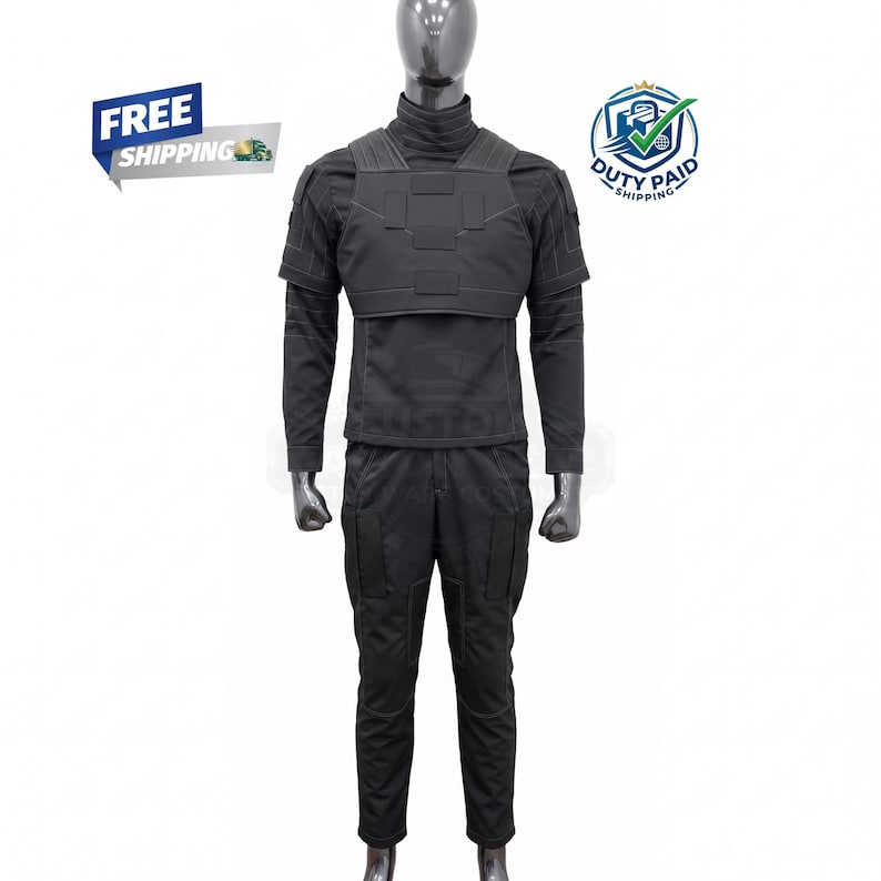May include: A black tactical uniform displayed on a mannequin. The outfit includes a long-sleeved shirt with a mock turtleneck, a chest plate, and cargo pants. The uniform is designed for a professional or tactical setting.