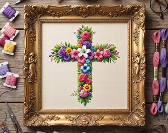 May include: A cross-stitch pattern of a floral cross featuring pink, purple, yellow, and white flowers with green leaves, framed in an ornate gold frame. Surrounding the frame are embroidery floss bobbins, scissors, a thimble, and glasses.