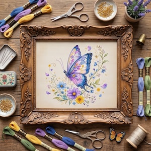 May include: A cross-stitch embroidery of a blue and purple butterfly surrounded by yellow and blue flowers, framed in an ornate brown wooden frame. Embroidery floss in blue, yellow, purple, and green, scissors, needles, and beads are arranged around it.