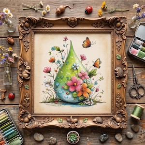 May include: A framed cross-stitch embroidery featuring a large green water droplet filled with colorful flowers and butterflies. The ornate wooden frame is decorated with small animal figures, including rabbits and hedgehogs, surrounding the central art.