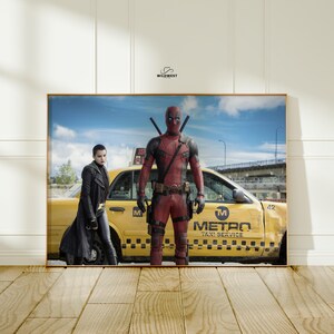 May include: Framed print featuring Deadpool in his red and black costume, standing in front of a yellow taxi cab. A woman in a black coat and pants is standing next to the cab. The taxi has the words "METRO TAXI SERVICE" on the side.