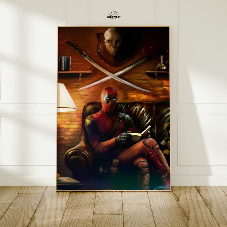 May include: A framed print featuring the character Deadpool in his red and black costume, seated on a leather couch and reading a book. The background includes crossed swords, a wall-mounted mask, and a lamp.