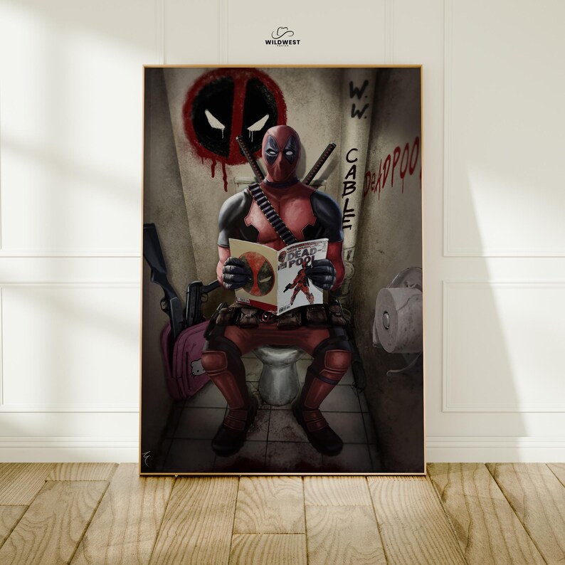 May include: Framed art print featuring Deadpool in a bathroom setting. The character is seated on a toilet, reading a comic book titled "Deadpool". The background includes graffiti and the Deadpool logo.