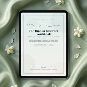 May include: A digital tablet displaying a workbook titled The Bipolar Disorder Workbook, featuring the subtitle Stabilising Your Mood and Improving Your Quality of Life, with text about evidence-based methods and DBT and CBT skills.