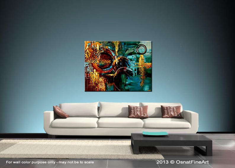 May include: Abstract painting with a mix of blue, green, brown, and gold colors. The painting features overlapping circles and geometric shapes.