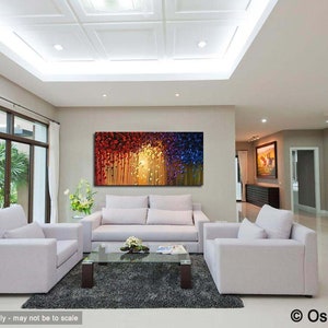 May include: A modern living room interior with white couches and a coffee table. A large abstract painting with red, yellow, and blue colors hangs on the wall.