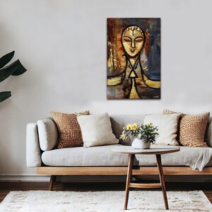 May include: Abstract painting of a person with a golden face and a blue background. The painting is done in a stylized, almost geometric style.