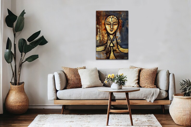 May include: Abstract painting of a person with a golden face and a blue background. The painting is done in a stylized, almost geometric style.