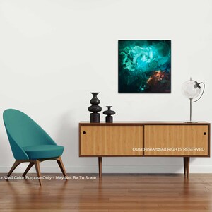 May include: Abstract painting in shades of teal, green, and brown, hanging on a white wall above a wooden sideboard with a teal chair and black vases.