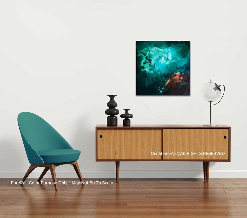 May include: Abstract painting in shades of teal, green, and brown, hanging on a white wall above a wooden sideboard with a teal chair and black vases.