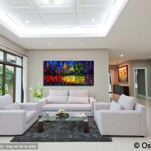 May include: Abstract painting in a modern living room with white couches and a coffee table. The painting features a cityscape with vibrant colors, including red, yellow, blue, and green.