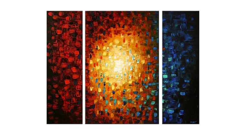May include: Abstract triptych painting with a central burst of light in shades of yellow, orange, and red. The left panel is predominantly red, the right panel is blue, and the center panel is a mix of colors.