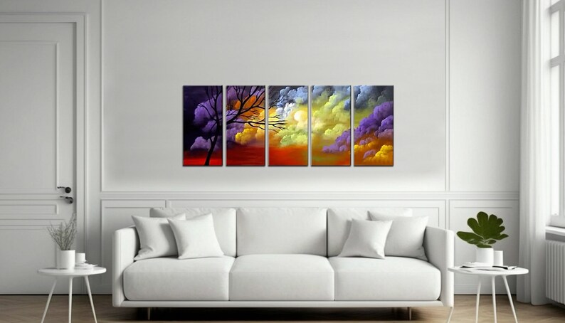 May include: A five-piece abstract painting set featuring a silhouette of a tree against a colorful sunset sky. The painting is divided into five panels, each with a different color scheme. The colors are vibrant and bold, and the overall effect is one of peace and tranquility.