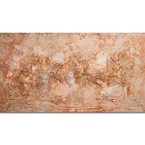 May include: Abstract textured painting with a neutral color palette. The artwork features a blend of beige, brown, and gold tones, with visible brushstrokes and layered textures. The piece has a horizontal orientation and a rough, tactile appearance.