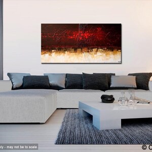 May include: Abstract painting with red, brown, and white colors. The painting is hanging on a white wall above a white sectional sofa with black pillows. A white coffee table with a black bowl and clear glasses sits in front of the sofa.