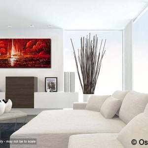 May include: A modern living room featuring a large abstract painting with a red and white sailboat scene. The room includes a white sofa, decorative vases, and a tall arrangement of brown branches in a white pot. The room has a minimalist design.