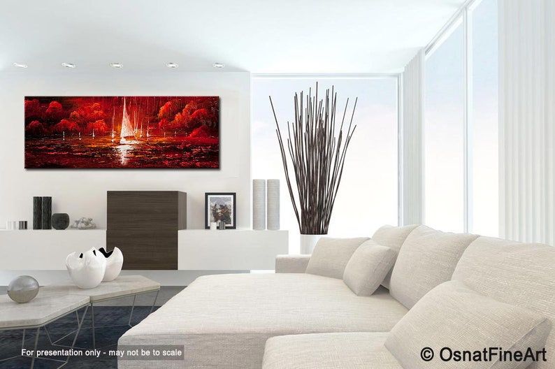 May include: A modern living room featuring a large abstract painting with a red and white sailboat scene. The room includes a white sofa, decorative vases, and a tall arrangement of brown branches in a white pot. The room has a minimalist design.