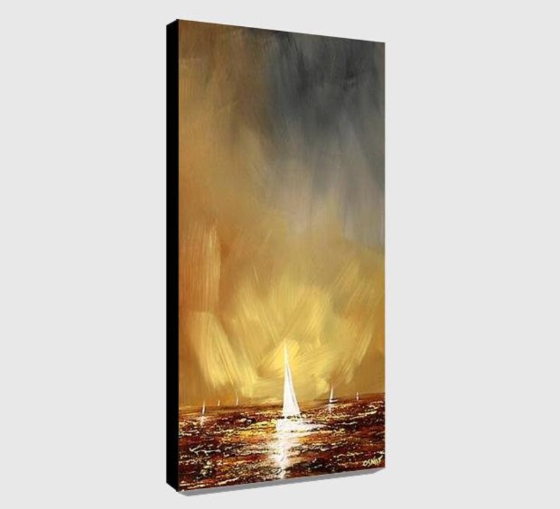 May include: An abstract painting of a seascape with sailboats. The artwork features a warm color palette of gold, brown, and gray, with a bright light reflecting on the water. The painting is on a black framed canvas.