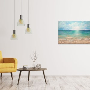 May include: A painting of a seascape with a blue sky, white clouds, and a turquoise ocean. The ocean is calm and the water is reflecting the sunlight. The beach is sandy and there are some footprints in the sand.