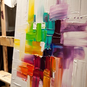 May include: Abstract painting on canvas with thick brushstrokes in shades of purple, green, yellow, orange, and red.
