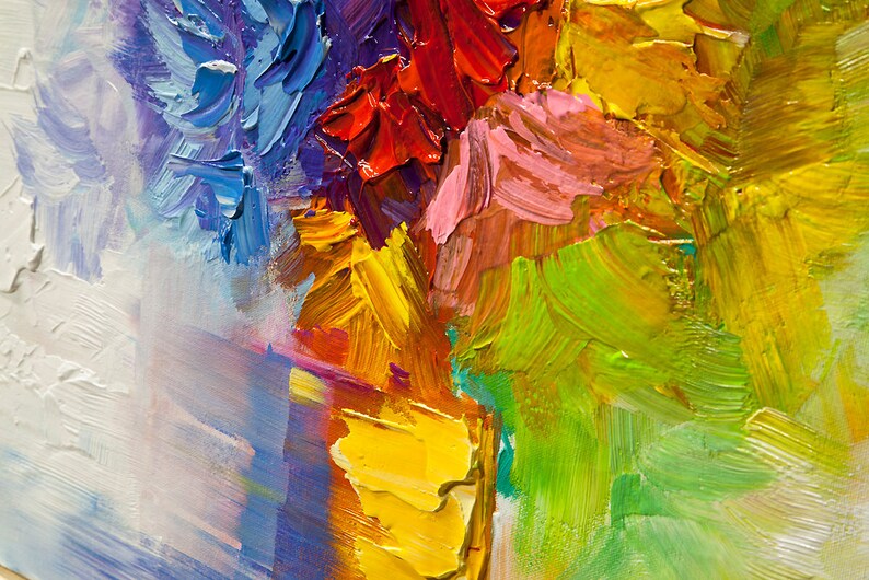 May include: Abstract painting with thick brushstrokes in shades of blue, purple, red, yellow, green, and white. The colors are vibrant and create a sense of movement and energy.