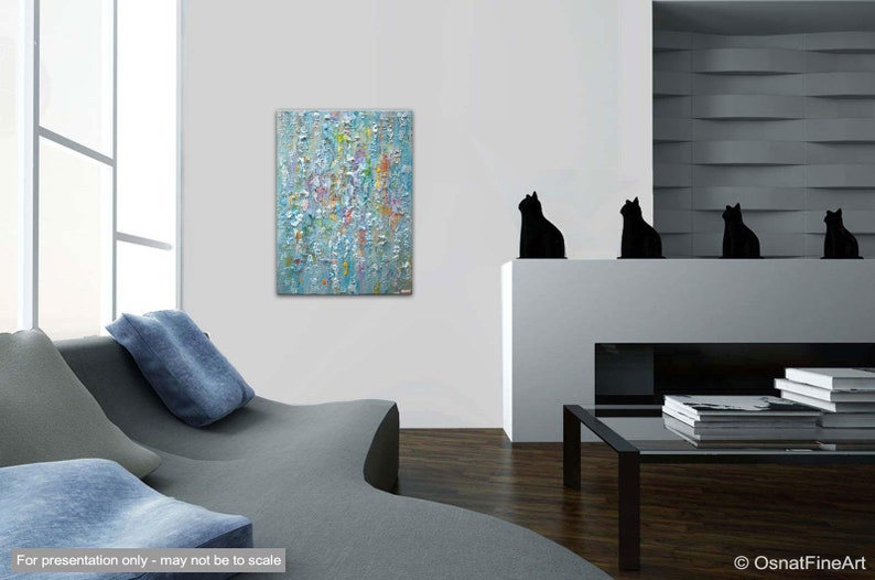 May include: Abstract painting with a textured, layered style. The painting features a blue background with splashes of yellow, white, and pink paint.
