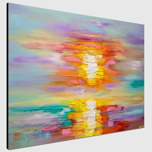 May include: Abstract painting of a sunset over a body of water. The sky is a mix of purple, pink, and orange, with streaks of yellow and white. The water is a turquoise blue, with hints of pink and orange reflecting the sunset.