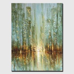 May include: Abstract painting of a city skyline with tall buildings in shades of green, blue, and gold. The buildings are reflected in a body of water at the bottom of the painting.
