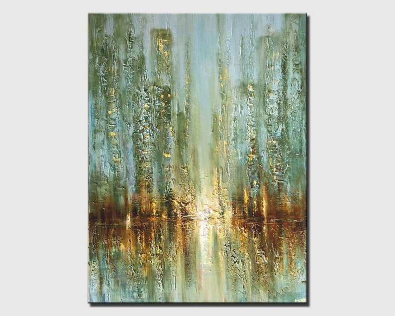 May include: Abstract painting of a city skyline with tall buildings in shades of green, blue, and gold. The buildings are reflected in a body of water at the bottom of the painting.