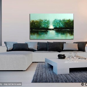 May include: Abstract painting of a lake scene with trees on either side of the water. The water is a light blue-green color and the trees are a dark green. The painting is hanging on a wall in a living room setting.