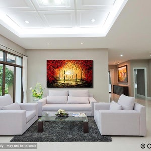 May include: A living room interior design with white couches and a coffee table. A large abstract painting of a forest scene in shades of red, orange, and yellow hangs on the wall.