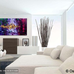 May include: Abstract painting with purple, blue, green, and gold hues. The painting is displayed on a white wall in a modern living room setting.