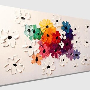 May include: A colorful abstract painting featuring a cluster of flowers in shades of red, orange, yellow, green, blue, and purple. The flowers are surrounded by white flowers with a textured, brushstroke effect.
