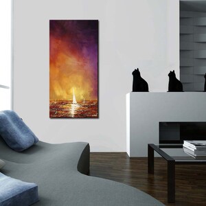 May include: Abstract painting of a sunset over the ocean with sailboats in the distance. The painting is in shades of orange, yellow, purple, and blue.