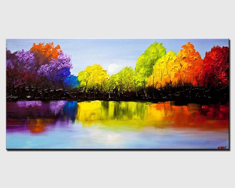 May include: A colorful abstract painting of a forest reflecting in a still lake. The trees are painted in shades of purple, blue, green, yellow, orange, and red. The lake is a deep blue with reflections of the trees in shades of purple, blue, green, yellow, orange, and red.