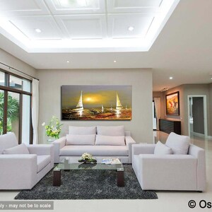 May include: A living room interior with white couches and a coffee table. A large painting of sailboats at sunset hangs on the wall above the couch.