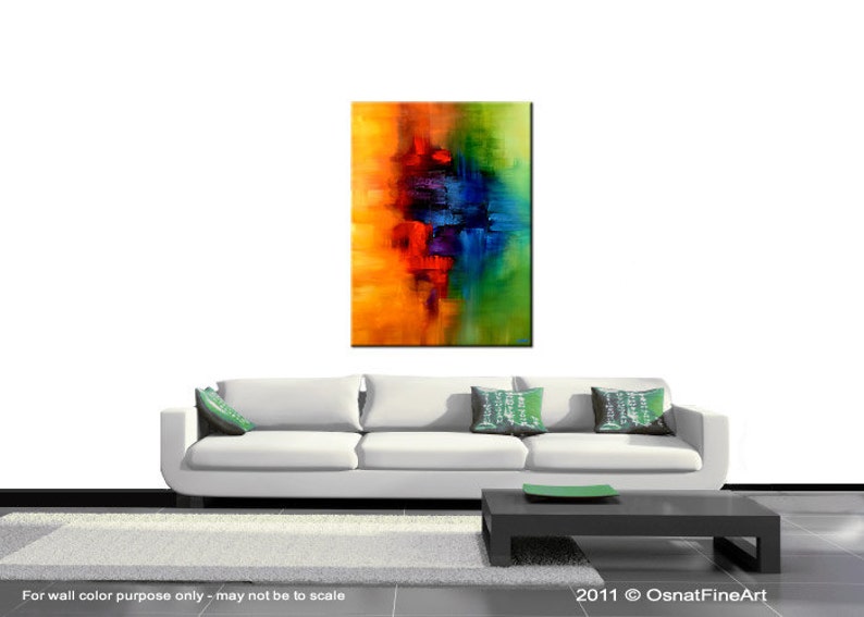 May include: Abstract painting with a vibrant color palette of yellow, orange, red, blue, green, and purple. The colors are blended together in a fluid and dynamic way, creating a sense of movement and energy. The painting is framed and ready to hang.