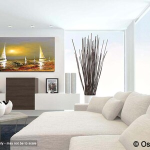 May include: A painting of sailboats on a body of water at sunset. The sky is a soft purple and orange, and the water is a deep blue. The sailboats are white and have a golden glow. The painting is framed and hanging on a white wall in a modern living room.