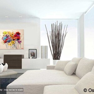May include: A colorful abstract painting of a bouquet of flowers in shades of red, yellow, pink, blue, and green. The flowers are painted in a loose, expressive style, with visible brushstrokes. The background is a light beige color.