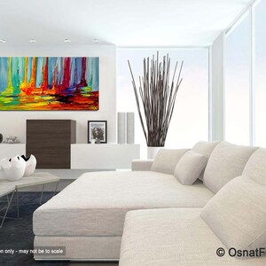 May include: Abstract painting with vertical brushstrokes in shades of blue, green, yellow, orange, and red. The painting is displayed on a white wall in a modern living room setting.