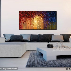 May include: Abstract painting with a colorful, textured design. The painting features a mix of red, orange, yellow, blue, and purple hues. The painting is displayed on a wall in a living room setting.