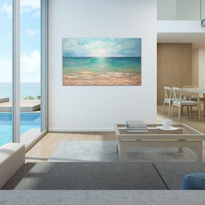 May include: A painting of a seascape with a sailboat in the distance. The painting is framed and hanging on a white wall in a modern living room. The room has a large window with a view of a swimming pool and the ocean.